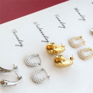 Nuevo  Nuevos pendientes de acero inoxidable brillantes